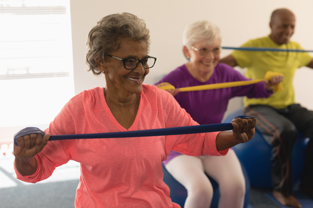 Diverse Senior Woman Exercising With Resistance